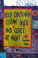 Copenhagen, Denmark A sign in English in the Christiania self-proclaimed freetown district saying ot keep the area clean, quiet and safe.