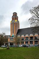 Forest, Brussels Capital Region, Belgium, March 4, 2023 - The Abbey park and the Art Deco tower of the city hall.