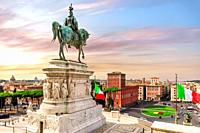 The equestrian statue of Victor Emmanuel II and the Venice Square or Piazza Venezia at sunset, Rome, Italy.