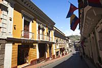Colonial buildings with balconies at the historic center, Quito, Ecuador, South America.
