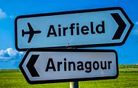 Airport sign on the Island of Coll, Scotland.