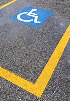 Parking space reserved for disabled people. Italy.