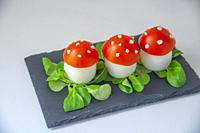 Spanish tapa made of egg and tomato as mushrooms. Spain.