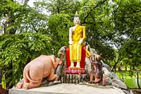 Buddha statue with an elephant and a monkey in the World Heritage historic city Ayutthaya, Thailand.
