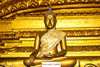 Golden Buddha inside the Buddhist temple Wihan Phra Mongkhon Bophit in the World Heritage historic city Ayutthaya, Thailand.