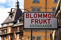 Stockholm, Sweden A sign in Swedish says: Flowers, Fruit, Vegetables in English translation.