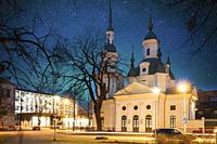 Parnu, Estonia. Night View Of Estonian Apostolic Orthodox Parnu Transformation Of Our Lord Church In Evening Night Illuminations. Bold Bright Blue Sta...