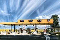 Cars Passing Through The Automatic Point Of Payment On A Toll Road. Point Of Toll Highway, Toll Station. Highway Toll Plaza Or Turnpike Or Charging Po...