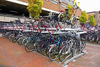 Bicycles bike rack storage transportation train station Haarlem Amsterdam Netherlands.