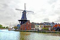 Historical Landmark Moen De Adriaan Windmill on the River Spaarne Harlem Amsterdam Netherlands NL.