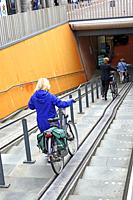 Bicycle Bike ramp entrance to train station Haarlem Amsterdam Netherlands.