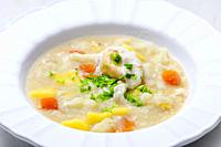 cauliflower soup with carrot, potatoes and poache egg.