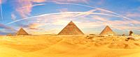 Picturesque panorama of the Pyramids and the Sphinx in the Giza desert near Cairo, Egypt.