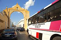Vehicles around the Arch and Quarter Of Dragons-Arco Y Cuartel De Dragones at the historic center, Merida, Riviera Maya, Yucatan State, Mexico, Centra...