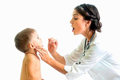 doctor examining little boy isolated on white background-stock-photo