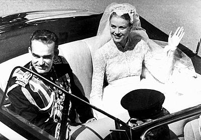 Prince Rainier and Princess Grace smile happily as they drive through the streets of Monte Carlo in an open car this morning. 19.4.56  Ref: B196_095070_4373 Date: 16.02.2001 Compulsory Credit: UPPA/Photoshot 19th April 1956 - Actress Grace Kelly marries Prince Rainier of Monaco.-stock-photo