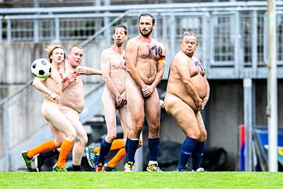 06 September 2020, North Rhine-Westphalia, Wuppertal: Naked footballers play in the stadium by the zoo. In protest against what they see as the increasing commercialisation of professional football, two teams competed naked against each other. The organizer of the naked football is the artist Starczewski, who wants to appoint each participant as an official naked player by certificate. Photo: Marcel Kusch/dpa. - Wuppertal/North Rhine-Westphalia/Germany-stock-photo