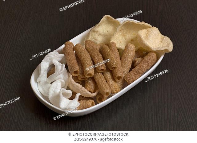 Variety snacks plate on wooden table