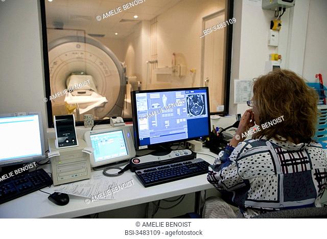 Photo essay at the department of medical imagery of the Diaconesses hospital in Paris, France. Radiologist. Head MRI