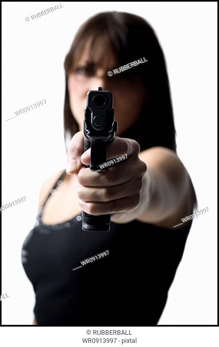 Violent woman with a handgun