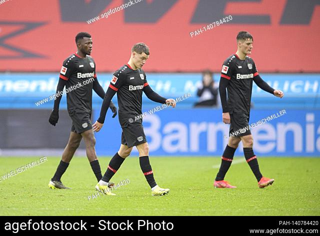 left to right Edmond TAPSOBA (LEV), Florian WIRTZ (LEV), Patrik SCHICK (LEV) disappointed after the game. Soccer 1st Bundesliga, 25th matchday