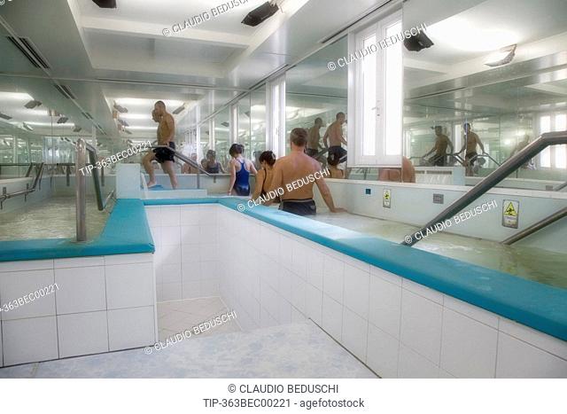 People at spa in thermal pool