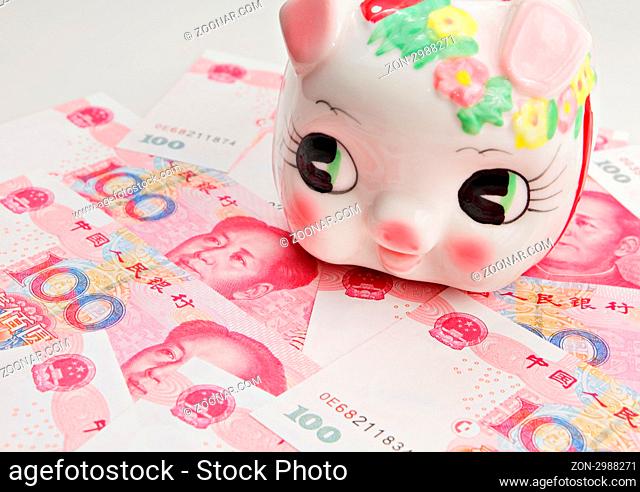 piggy bank on china banknote