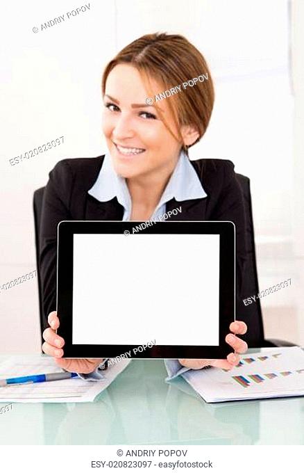 Businesswoman Presenting Digital Tablet