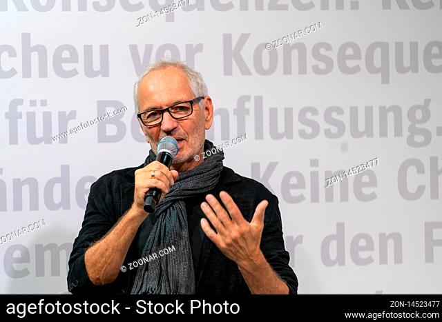 FRANKFURT AM MAIN, Germany - October 17 2019: Eugen Ruge (*1954, German writer and translator) talking on stage at 71st Frankfurt Book Fair / Buchmesse...