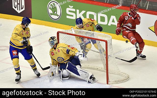 From left Claude-Curdin Paschoud of Davos, Gilles Senn of Davos, Davyd Barandun of Davos, Marko Dano of Trinec in action during the Ice-hockey Champions League...