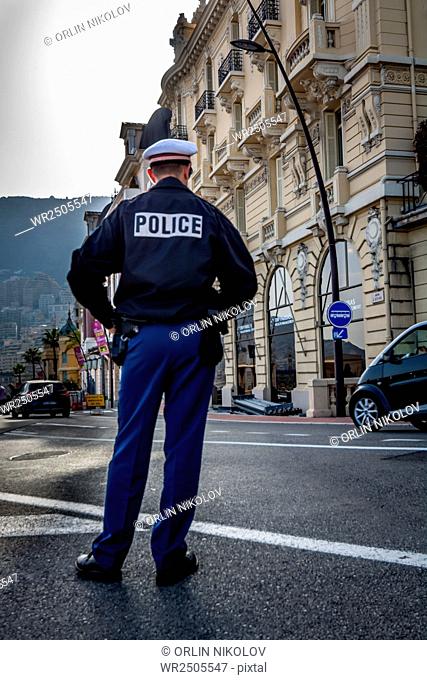 Policeman standing in the street