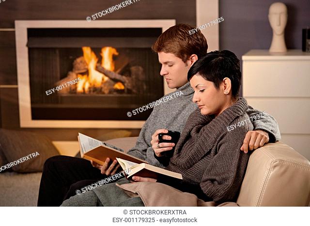 Couple reading at home