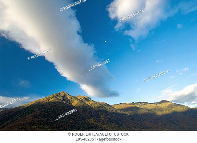 Clouds over Pyrenees mountains, Artiga de Lin valley. Vall d'Aran, Catalonia, Spain