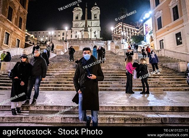 The shopping streets during the Christmas period during the coronavirus pandemic, Piazza Di Spagna, stairway of Trinità dei Monti in Rome , ITALY-11-12-2021