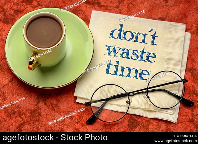 do not waste time - inspirational handwriting on a napkin with a cup of coffee, business, procrastination and productivity concept
