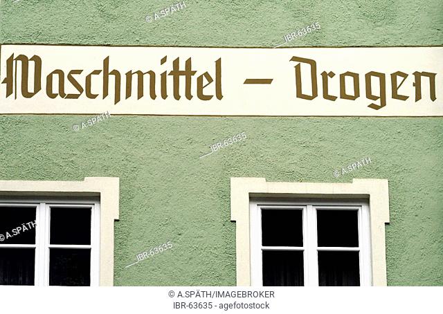 Munich, Bavaria, GER, Germany: The letters of washing powder and drugs on a house wall of a historical building