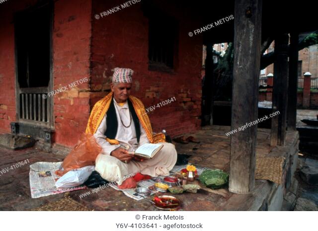 Astrologer ( Patan, Nepal). He is waiting for clients at the Kumbheshwar temple
