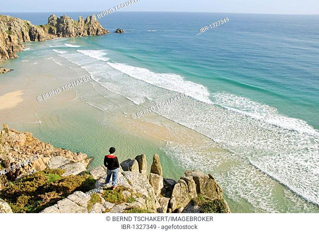 Women looking at waves and the beach, lookout, Porthcurno Beach, Pedn Vounder Beach, Logan Rock, South Coast, Cornwall, England, United Kingdom, Europe