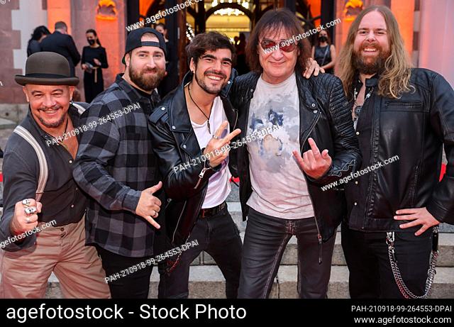 17 September 2021, Saxony, Leipzig: Dieter Birr (2nd from right), musician and former member of the Puhdys, comes to the ""Goldene Henne"" award ceremony with...