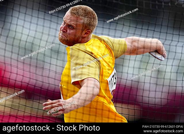 30 July 2021, Japan, Tokio: Athletics: Olympics, preliminary competition, discus throw, men, qualification at the Olympic Stadium