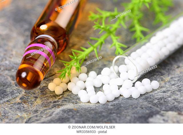 alternative medicine with homeopathic and herbal pills