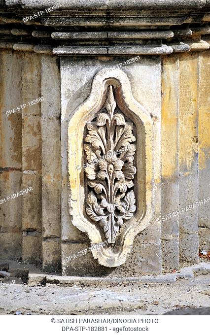 carving on wall of mahabat maqbara at junagadh gujarat india Asia