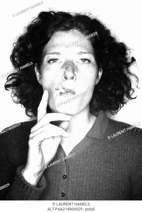 Woman smoking, portrait, b&w