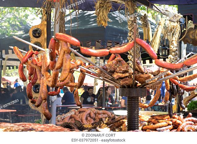 medieval barbecue with sausages, octopus, meat, ribs and all kinds of traditional foods in Spain