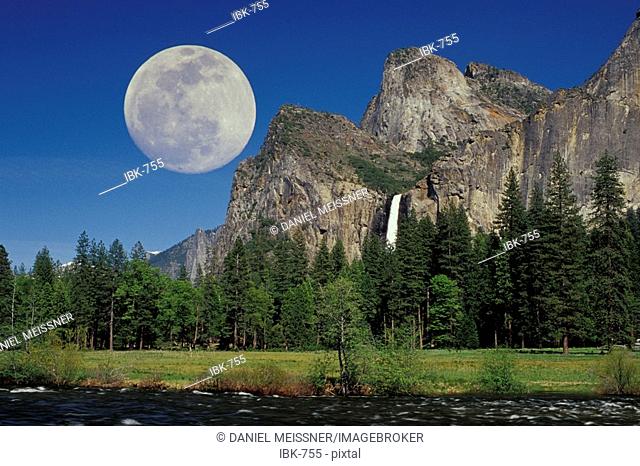 Full moon at Cathedral Rocks and Bridalveil Falls Yosemite Valley Yosemite National Park Sierra Nevada California USA