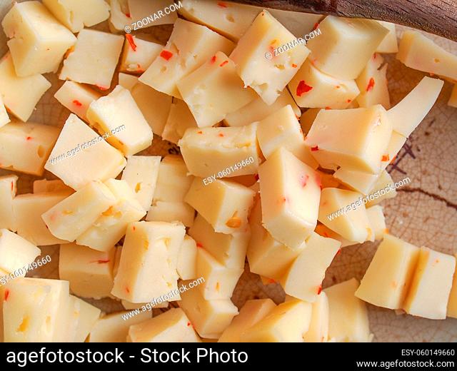 Cheese with Hot chili peppers (Capsicum) aka chile pepper or chilli pepper vegetables vegetarian food