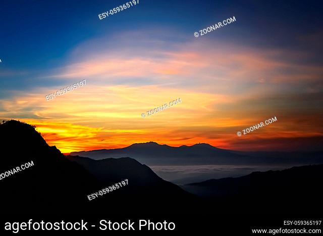 Early morning after sunrise view of the spectacular Gunung Bromo and Sumeru volcanoes in Java, Indonesia