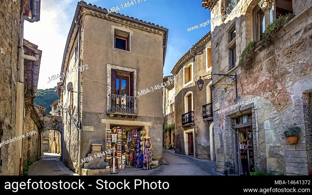 Village street in Saint Guilhem le Désert. Part of the UNESCO World Heritage Site Way of Saint James in France awarded. The village belongs to the Plus Beaux...