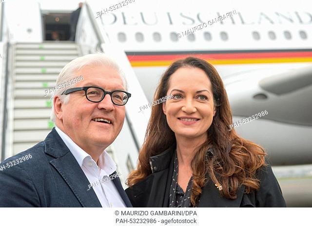 German Foreign Minister Frank-Walter Steinmeier (SPD) and the actress Natalia Woerner pose prior their flight to South Korea in Berlin, Germany, 30 October 2014