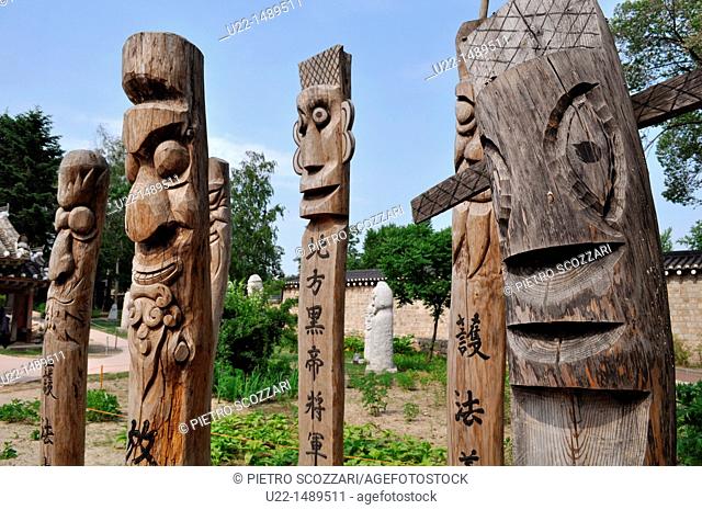 Seoul (South Korea): wooden statues by the National Folk Museum; usually put at the entrance of a village or on the roadside